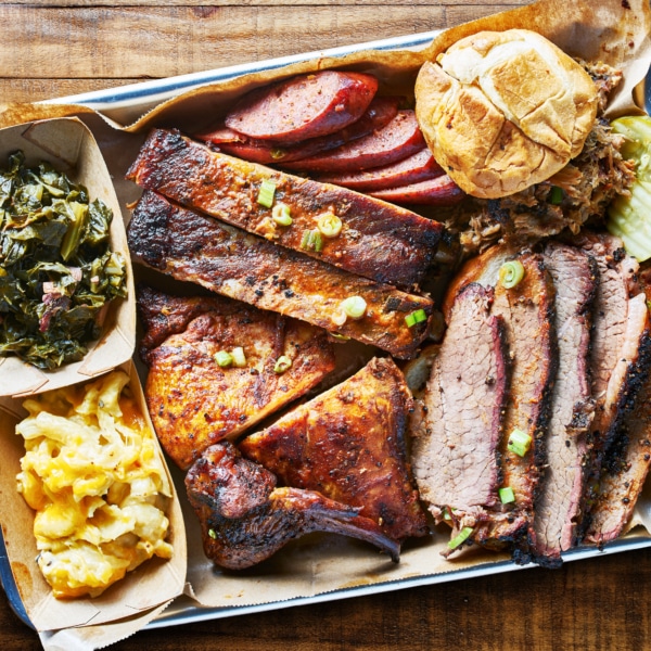 texas bbq platter on wooden table in copy space composition